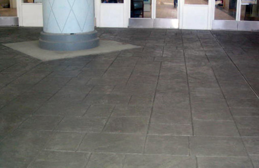 Bomanite imprinted site concrete Bomanite concrete utilizing English Slate imprint system with Atlantic Gray color accents throughout by Belarde Company